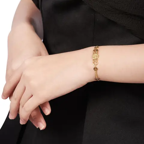 Lắc Tay Kim Tiền Vàng 18k Giá Bao Nhiêu