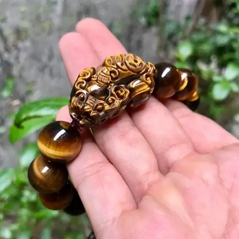 Vòng Tay Đá Mắt Hổ Vàng Giá Bao Nhiêu